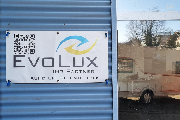 Firmenschild von Evolux in Burgdorf